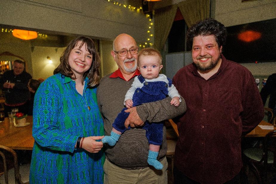 Rowan, Alan, Ledger, and Doug pose for a photo at Alan's birthday party